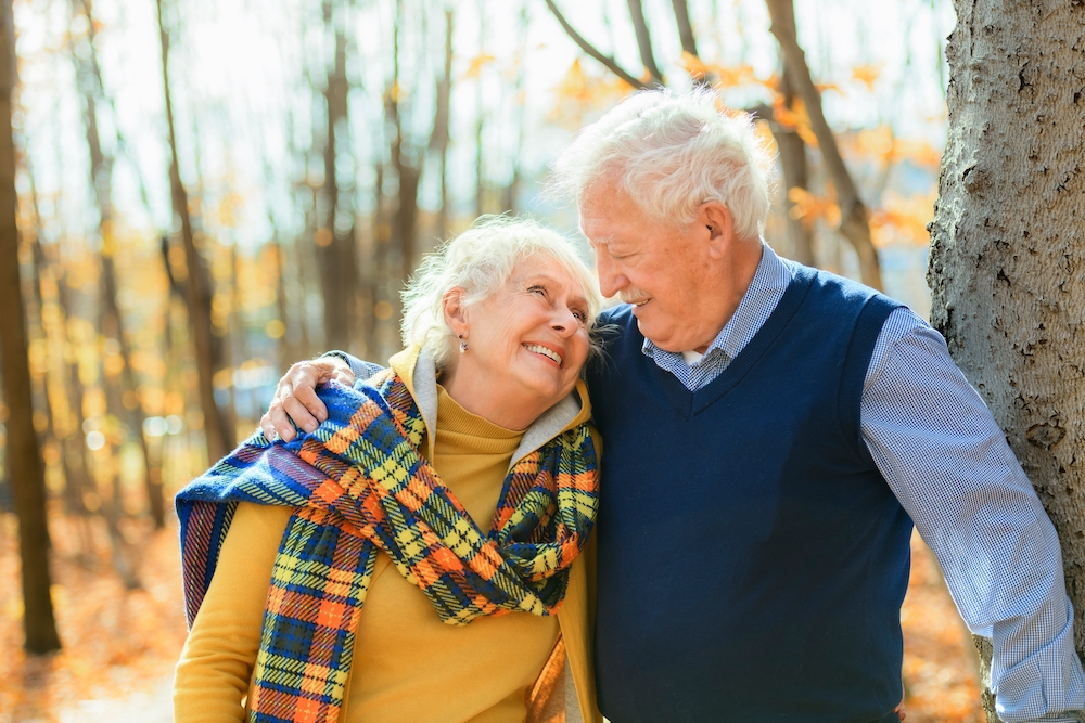 A senior couple going for a walk around their Elkhorn luxury independent living community
