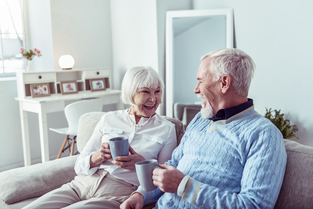 A senior couple drinks tea at their residence at the independent living in Elkhorn